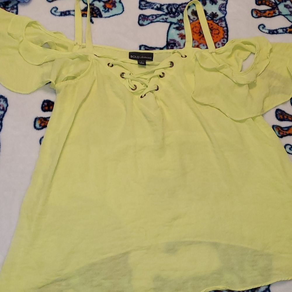 Bold elements off shoulder top